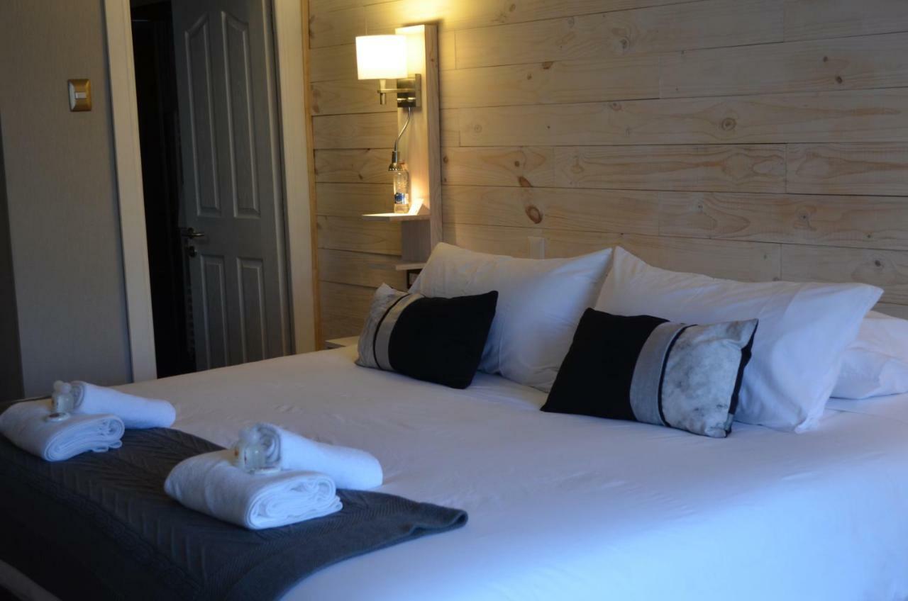פואנטה ארנס Hostal Boutique Puerta Roja מראה חיצוני תמונה